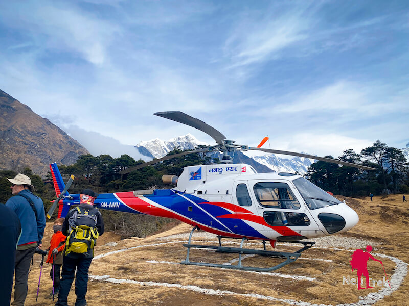 Manang Air Helicopter at Hotel Everest View, waiting for passengers on Everest Base Camp Helicopter Tour to finish the breakfast and join the return flight to Kathmandu