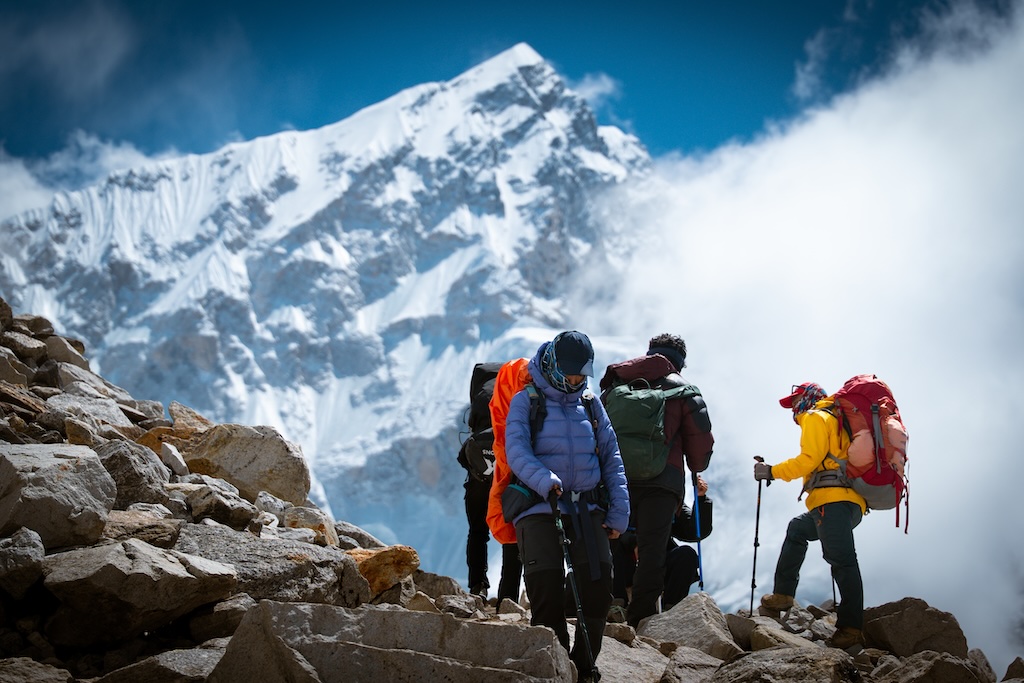 Trekkers crossing Khumbu Glacier, en route to Everest Base Camp